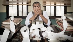 Man in office (Stokkete/Shutterstock.com) spectator.org