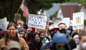 Protest in Seattle, Washington, June 12, 2020, illustrating piece on identity politics (VDB Photos/Shutterstock.com) spectator.org