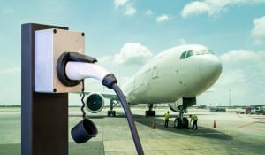 Electric airplane with charger (Surasak_Photo/Shutterstock.com) spectator.org