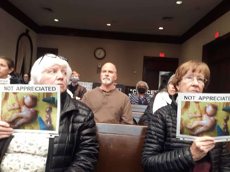 Pro-life demonstrators attend the Alexandria City Council meeting on March 8, 2022. (Jonathan Darnel)
