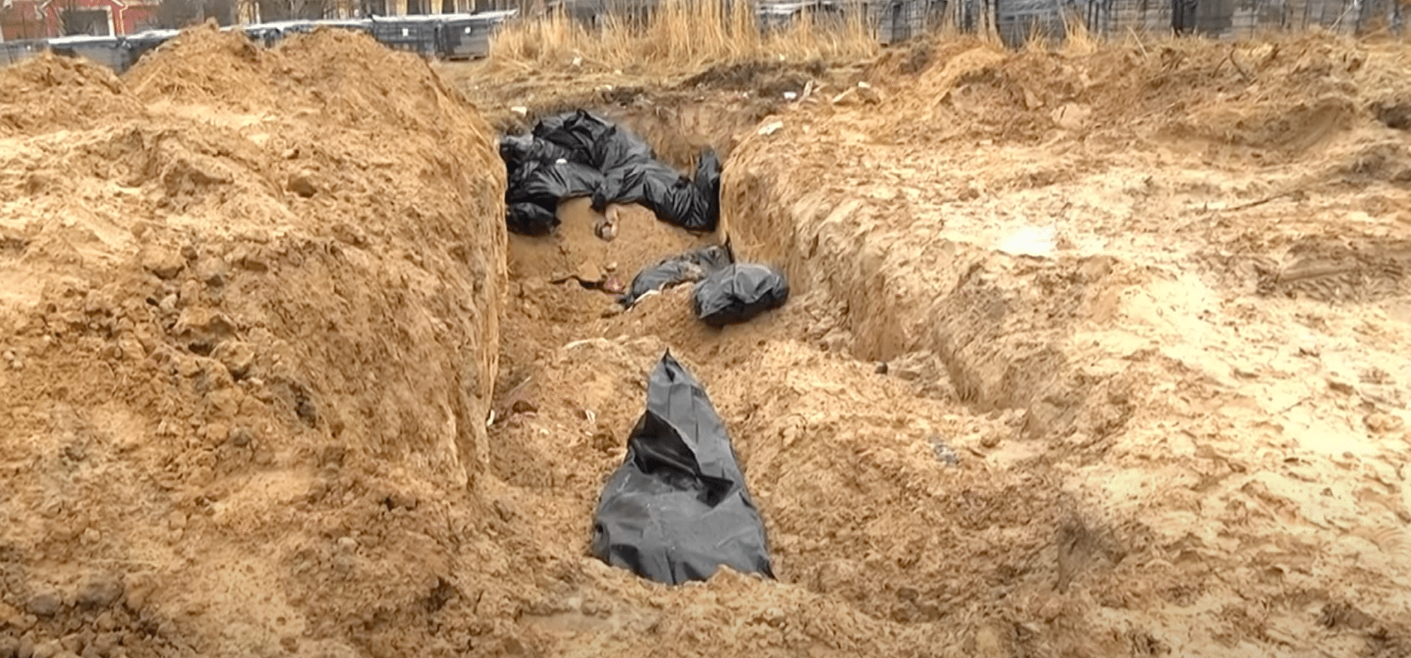 A mass grave discovered in Bucha, Ukraine. (Insider News/Youtube)