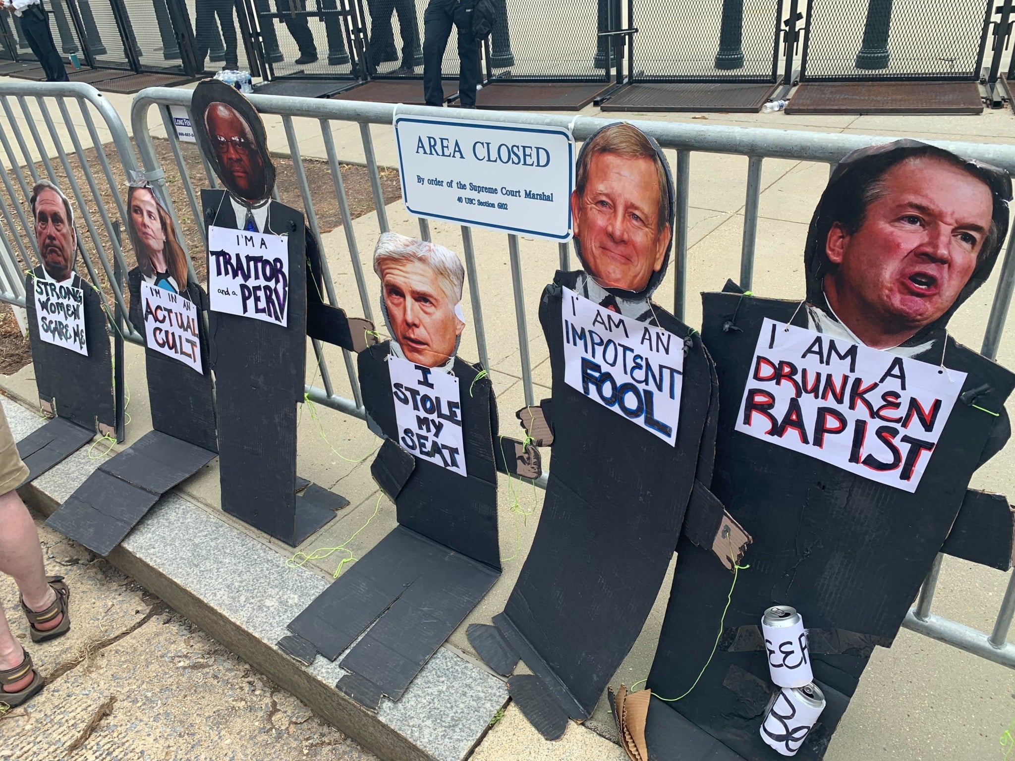 Signs opposing the conservative Supreme Court Justices. (Hunter Oswald/The American Spectator)