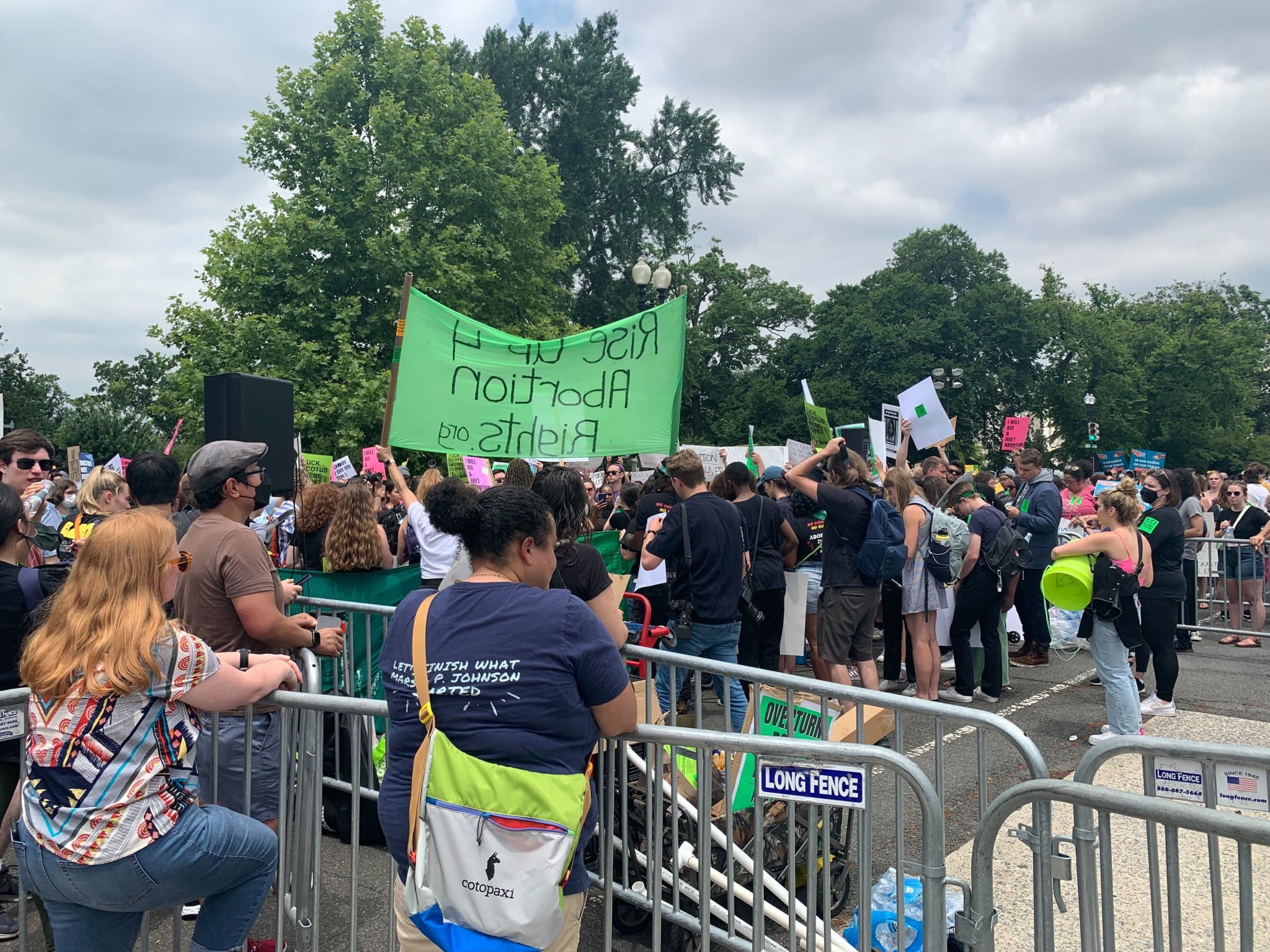 Protestors in the street in front of the Supreme Court. (Hunter Oswald/The American Spectator)