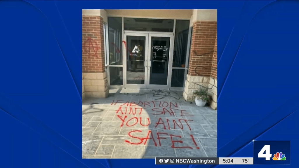 The threatening graffiti left on the sidewalk and walls of the Blue Ridge Pregnancy Center on June 25, 2022.