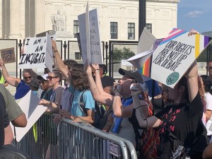 Pro-abortion protestors challenging pro-life demonstrators with the counter chants: “my body my choice,” and “We are not your incubators” (Hunter Oswald/ The American Spectator)