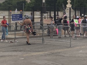 Democrat for Life member who chanted: “Pro-Choice is a Lie” and “Not your body, not your choice” in front of pro-abortion protestors during Sunday afternoon’s protests in front of the Supreme Court (Hunter Oswald/ The American Spectator)