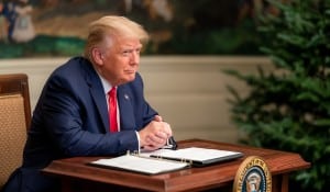 President Donald J. Trump speaks with military service personnel Thursday, Nov. 26, 2020, during a Thanksgiving video teleconference call from the Diplomatic Reception Room of the White House. (Official White House Photo by Shealah Craighead)