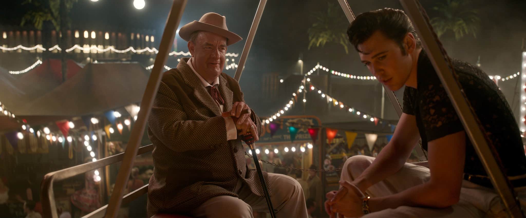 Tom Hanks as Colonel Tom Parker and Austin Butler as Elvis in Warner Bros. Pictures’ drama Elvis, a Warner Bros. Pictures release. Photo courtesy of Warner Bros. Pictures.