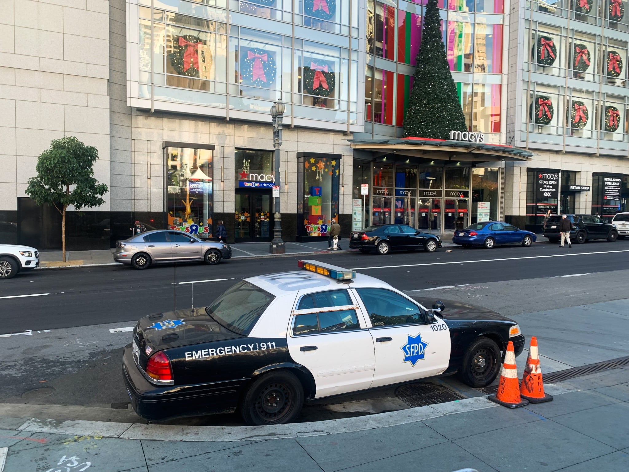 A police car sits in front of Union Square in San Francisco, California, on Nov. 30, 2022. 