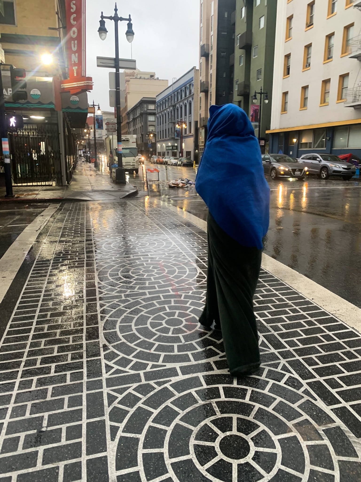 A homeless man walks through the streets of San Francisco, California (The American Spectator)