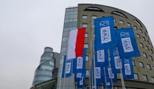 Flags outside of TVP headquarters in Warsaw, Poland (Elzbieta Krzysztof/Shutterstock)