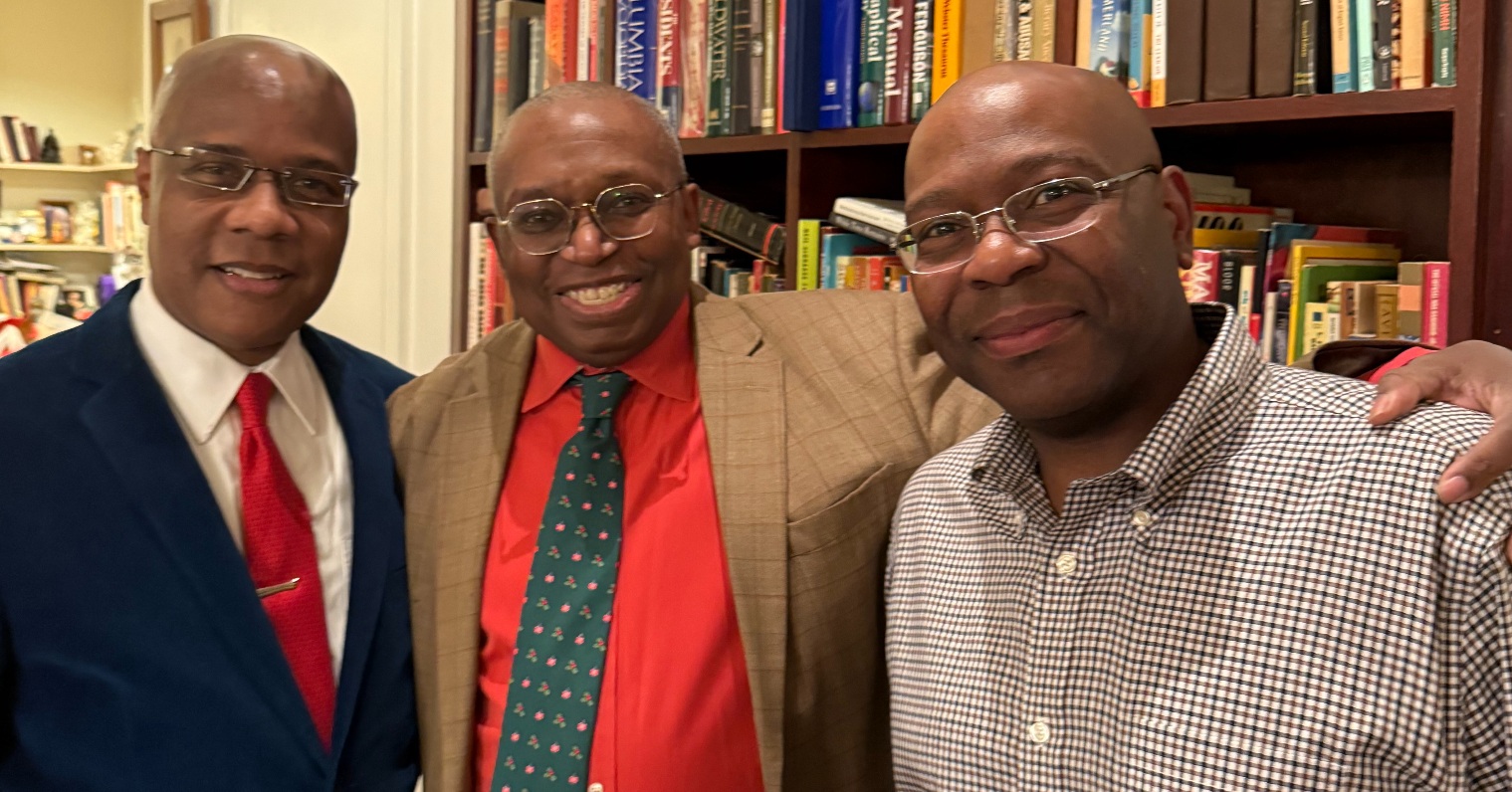 Deroy Murdock, Robert A. George, and Jason L. Riley celebrate the Christmas season. (Photo: Orie Bolitho, December 14, 2025)